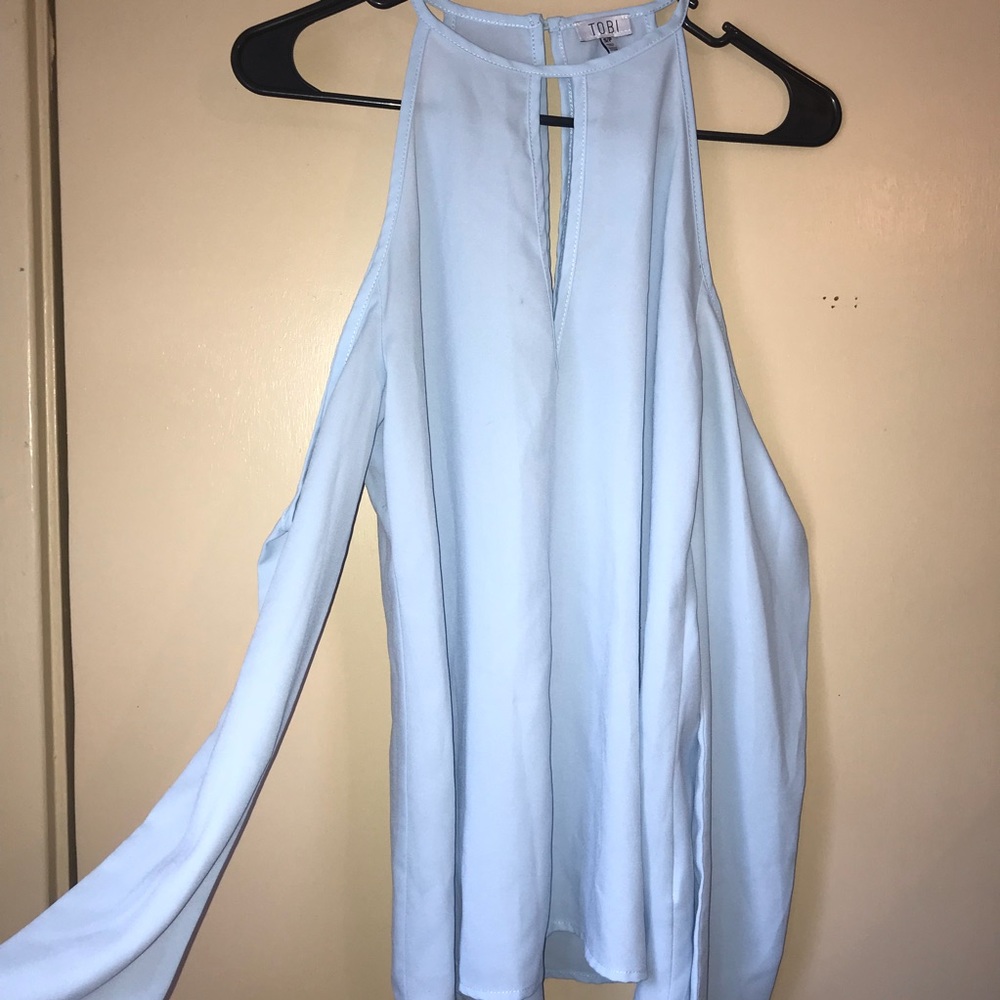 Light blue open shoulder long sleeved shirt